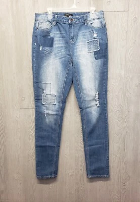 Pantalones de mezclilla Ashley Stewart para mujer 12 altos ajustados elásticos desgastados parche 34x33,5 medio Foto 1 de 4