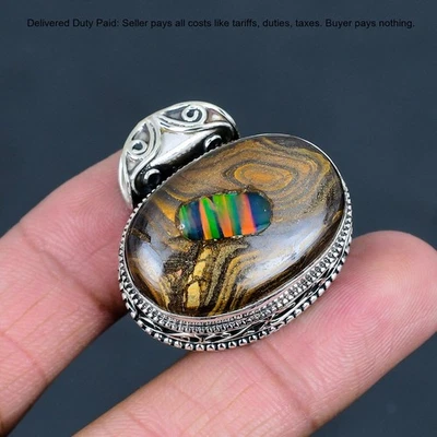 Colgante de compromiso vintage de plata 925 con piedra de ópalo etópico ovalado en roca Foto 1 de 4