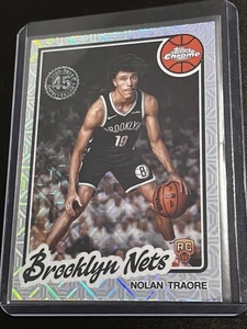 2025-2026 Topps Basketball NOLAN TRAORE Rookie Mojo Refractor Card #TC-NT (RC) - Bild 1 von 2