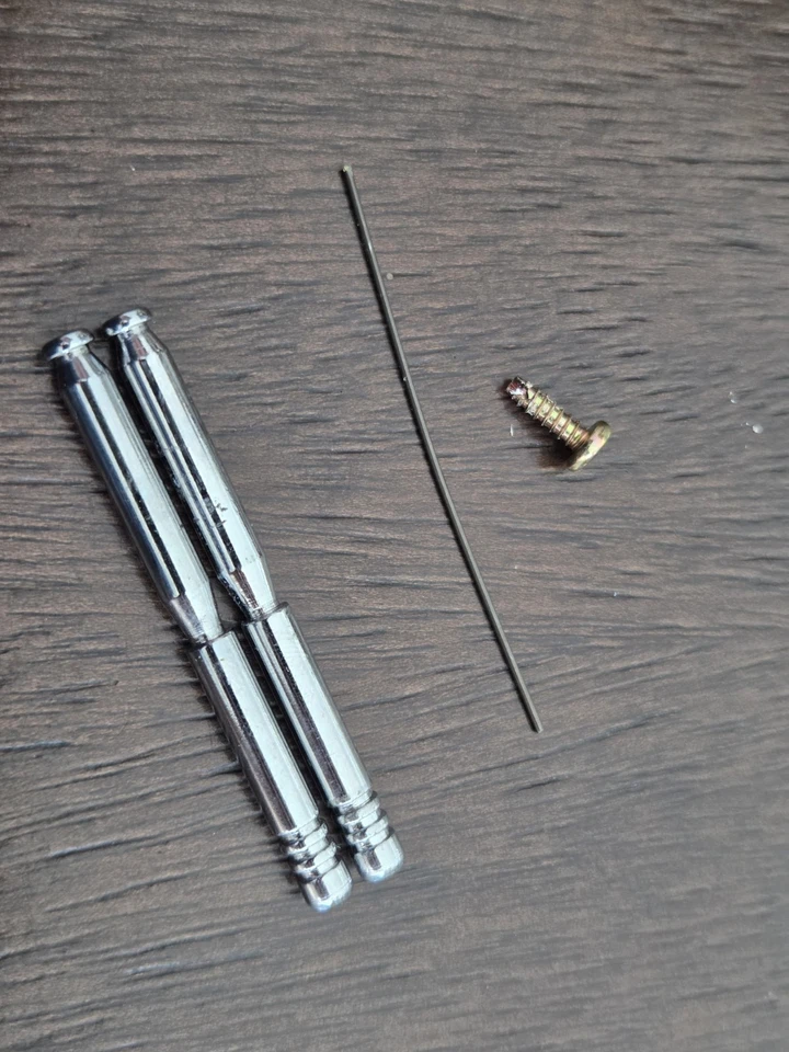 KENMORE MODEL 385 SPOOL PINS   (OEM) - Image 1 of 1