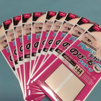 Juego de 10 paquetes de cinta adhesiva delgada estilo yeso estilo 144 hojas de doble párpado Daiso Foto 1 de 4