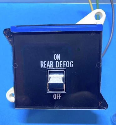 1977-89 CADILLAC DEVILLE, FLEETWOOD, BROUGHAM DEFOG SWITCH & MOUNT PANEL - Image 1 of 4