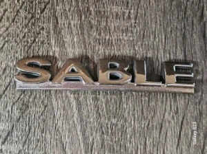 MERCURY SABLE NUEVO EMBLEMA DE ESCRITURA INSIGNIA TRASERA PARACHOQUES OEM  - Imagen 1 de 2