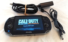 Sony PS Vita PCH-1101 System With Sony Charger & Call Of Duty Black Ops Declassi