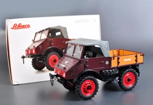 Modellino auto pressofuso 1/18 Schuco Mercedes Benz Unimog U401 ORV collezione giocattolo - Foto 1 di 10
