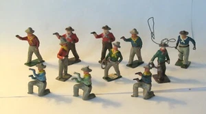 Vintage cast metal toy Cowboys with guns folk art Americana Wild West England - Picture 1 of 3
