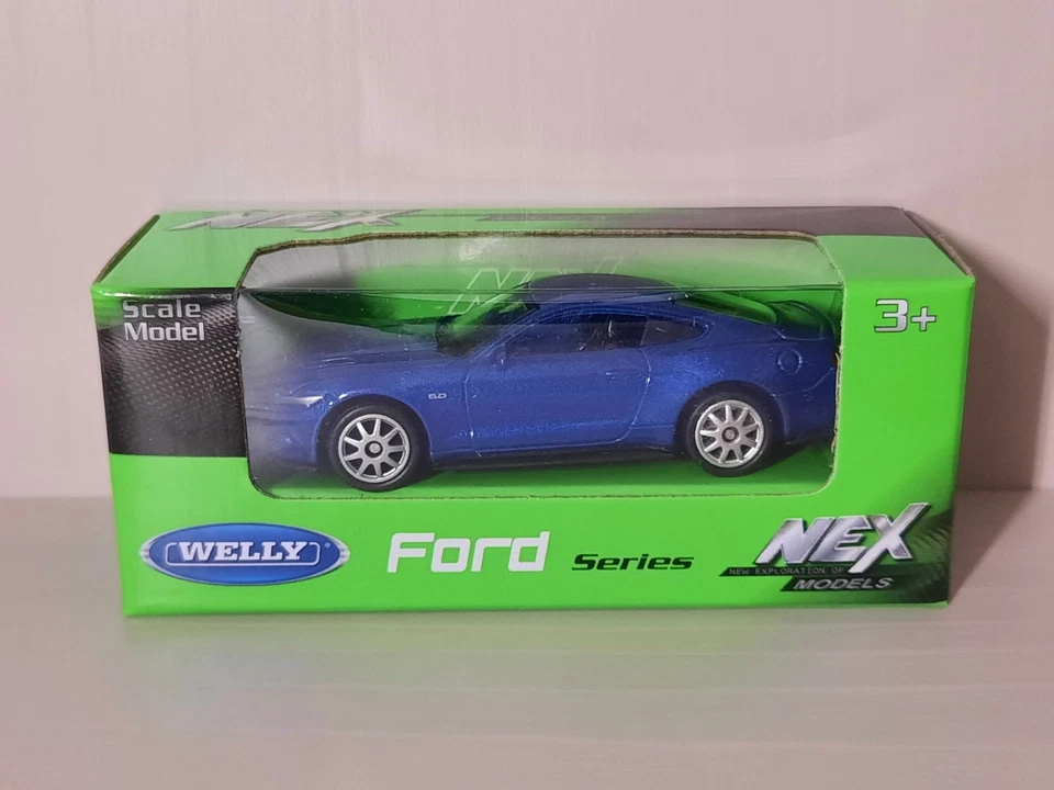 Modellino Statico Ford Mustang GT (2015) Welly Auto Colore Blu Scala 1:64 - Immagine 1 di 1