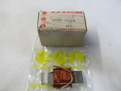 SUZUKI TS400 BOBINA DE ILUMINACIÓN MAGNETO GENUINA NUEVA 33120-32020 1972-1975 Foto 1 de 2
