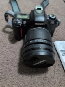 Cámara fotográfica Nikon F65 con lente Tamron 28-200 mm con portador y manual original  - Imagen 1 de 6