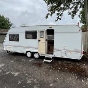 Elddis Grand Storm 4 Berth Twin Axle Caravan with End Bathroom + Full Awning - Picture 1 of 21
