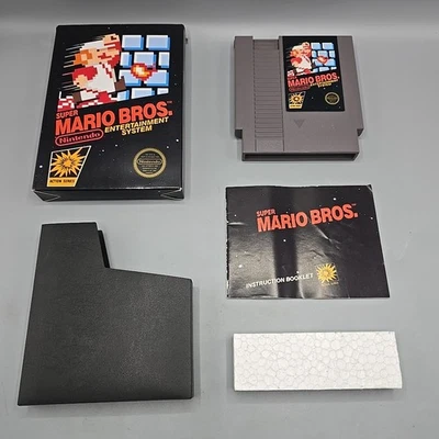 Super Mario Bros. (Nintendo NES, 1985) Complete With Manual CIB Hang Tab 5 Screw - Image 1 of 4