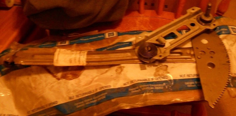 NOS 1990-93 Chevrolet Lumina LH Front Window Regulator - Image 1 of 1