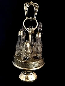 Silver etched cut glass caster Cruet 7 piece set by Simpson, Hall, Miller & Co. - Picture 1 of 12