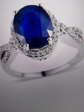 Tanzanian Blue Spinel and White Zircon Infinity Shank Ring