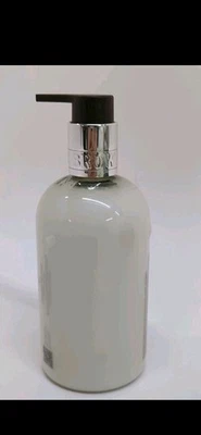 Loción de manos Molton marrón naranja y bergamota 10 fl. oz. Foto 1 de 2