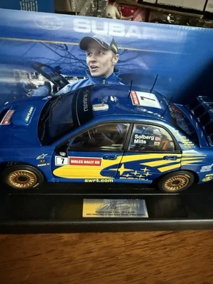 SUBARU OFFICIAL Hat IMPREZA  Petter  Solberg 2003  RALLY GB Winner 1/18 #7 - Image 1 of 4