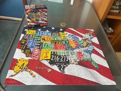 Majestic Springbok Family Puzzle STATE LICENSE PLATES USA Flag Map 1000 Pieces - Image 1 of 4