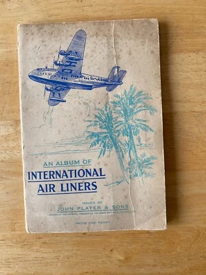 AN ALBUM OF INTERNATIONAL AIR LINERS JOHN PLAYER CIGAR CARDS GOOD CONDITION - Image 1 of 4