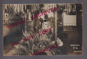 Delavan ILLINOIS RPPC 1908 INTERIOR POST OFFICE Mailmen Mail FERNS PALM TREES IL - Picture 1 of 4