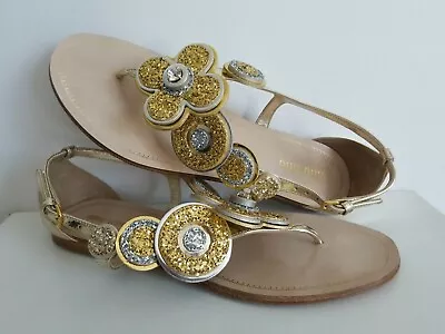 SANDALIAS PLANAS DE BODA FLORES BRILLANTES DORADAS MIU MIU UE 37.5 ME ENCANTAN LOS ZAPATOS Foto 1 de 4