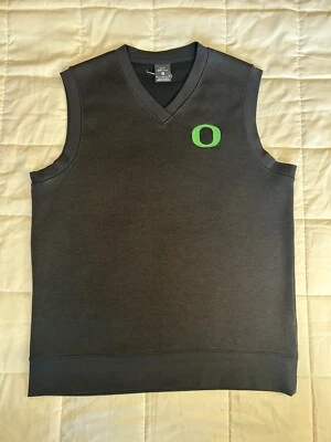 Colete suéter de golfe Nike Dri Fit Oregon Ducks preto masculino médio - Imagem 1 de 4