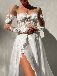 Unique corset wedding dress with lace appliqués and 3D flowers - Picture 1 of 15