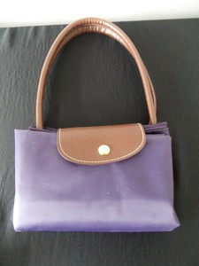 how to fold a longchamp bolsa