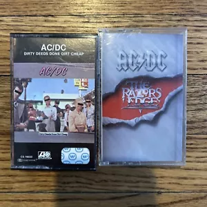 Set Of 2 AC/DC Cassette Tapes Dirty Deeds Done Dirt Cheap The Razors Edge - Imagen 1 de 4