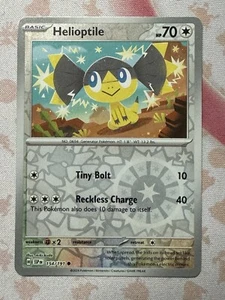 Pokémon TCG Helioptile 154/191 Sv08: Surging Sparks Reverse Holo - Picture 1 of 1