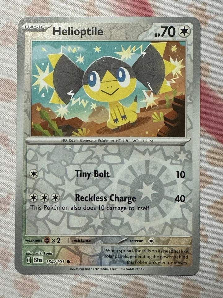 Pokémon TCG Helioptile 154/191 Sv08: Surging Sparks Reverse Holo - Image 1 of 1