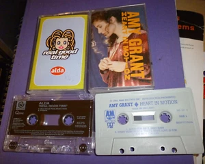 2 CASSETTES 1998 ' REAL GOOD TIME' BY ALDA & AMY GRANT 'HEART IN MOTION' 1991 - Picture 1 of 4