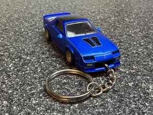 Chevy Camaro 1985 llavero azul Hot Wheels Matchbox - Imagen 1 de 4