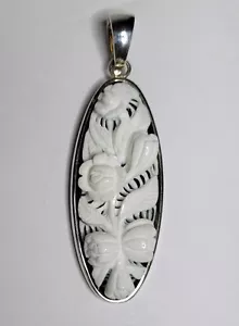 Whitney Kelly White on Black Carved Flowers Sterling Pendant - Picture 1 of 3