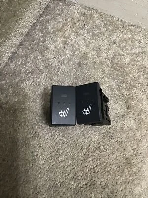 Par de interruptores de asiento térmico Mazda 3 Foto 1 de 4