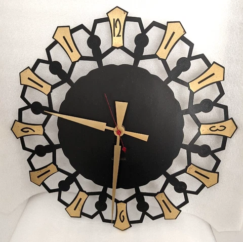 WE. Mid Century Modern Quartz Wrought Iron Wall Clock Made in Germany 11.5" Cover