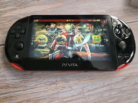Sony PS Vita System with Bundle 1000+  w Charger