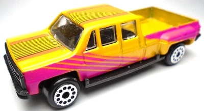 MADE IN CHINA D102 ORANGE 1:64 DIECAST 3" PICKUP TRUCK W/ PURPLE & BLACK STRIPES - Image 1 of 4