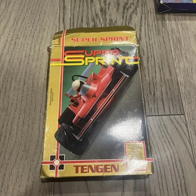 Super Sprint Tengen (Nintendo Entertainment System NES, 1989) COM DANOS NA CAIXA - Imagem 1 de 4