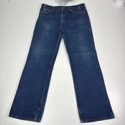 Pantalones de mezclilla vintage Levis 517 Bootcut naranja con lengüeta hechos en EE. UU. talla 38x32 lavado oscuro Foto 1 de 4