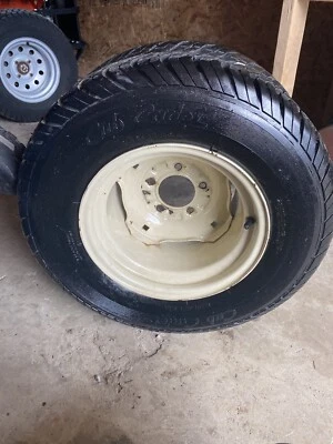 CUB CADET 1641/super Cubs REAR WHEEL AND TIRE 23X10.50-12 5 LUG - Image 1 of 3