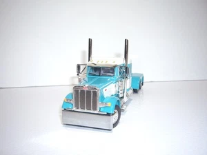 DCP FIRST GEAR 1/64 TURQUOISE AND WHITE PETERBILT 379 WITH 36" SLEEPER - Picture 1 of 5