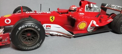 Hot Wheels - Ferrari F2004 - Michael Schumacher - Pubblicità tabacco e Dirt Look 1/18 - Immagine 1 di 4