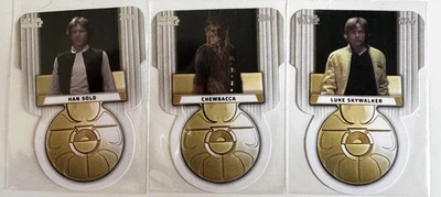 2025 TOPPS Meiyo - Medal of Yavin Die-Cut Set, Luke - Han - Chewie (Y1-Y2-Y3) - Image 1 of 2