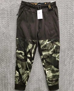 Pantaloni da allenamento Nike Therma Fit mimetici conici DQ6618-220 marroni da uomo medi nuovi con etichette - Foto 1 di 13