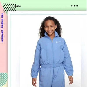 Nike Sportswear Windrunner Kids' Girls Loose Jacket, Paisy Purple, Medium - Picture 1 of 3