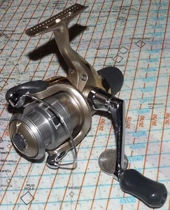 SHIMANO SIENNA 1000 SPINNING FISHING REEL REAR DRAG, PUSH-BUTTON SPOOL ULTRA Lht - Picture 1 of 13