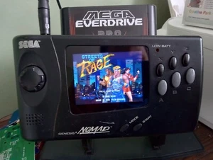Sega Nomad w/ ultimate Mod: RGB DRV, Recap, SMS, Sega cd, EMP mod ,free region - Picture 1 of 6