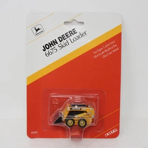 Ertl John Deere 6675 1997 minicargadora escala 1/64 #5925 nueva en equipamiento - Imagen 1 de 3