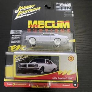 JOHNNY LIGHTNING MECUM AUCTIONS 1974 PONTIAC GTO WHITE LIGHTNING WITH TIN CASE - Picture 1 of 2