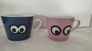 SET OF 2 IKEA GLODANDE WALTER VAN BEIRENDONCK MUGS - ROUND EYES - PINK & BLUE - Picture 1 of 12